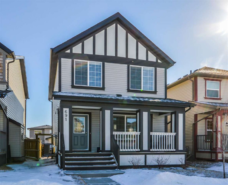 House exterior during a snowy day